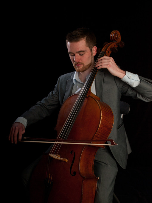 Sam Creer 
 Cellist Sam Creer 
 Keywords: Cellist, Sam Creer, cello, musician, music, bow, low light, London, photo, photography